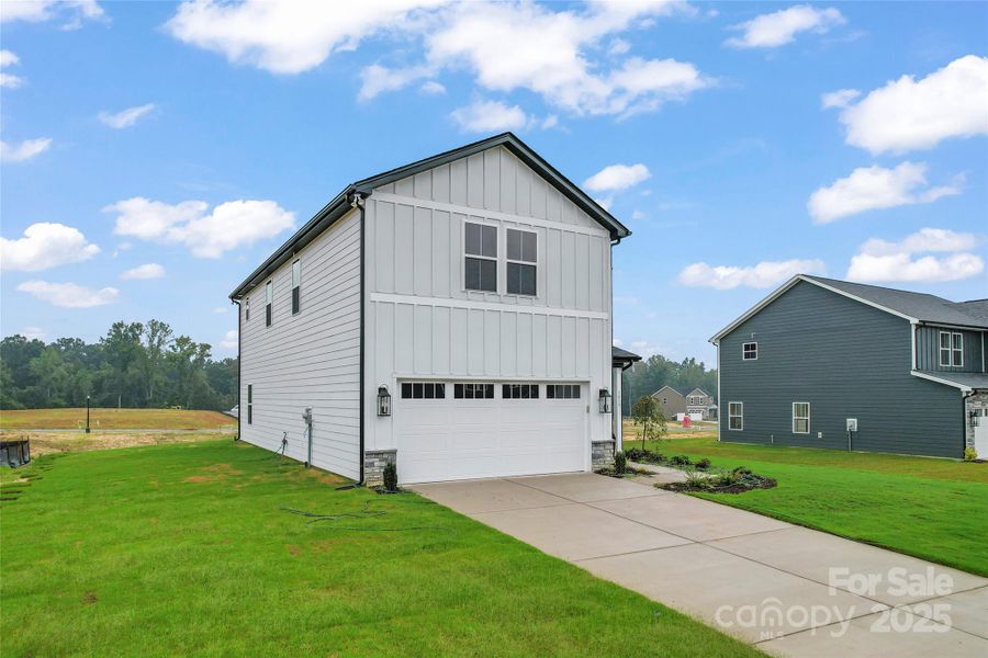 Front exterior of a new home in , Kannapolis, NC, highlighting curb appeal (Image 16). Front exterior of a new home in , Kannapolis, NC, highlighting curb appeal (Image 16).