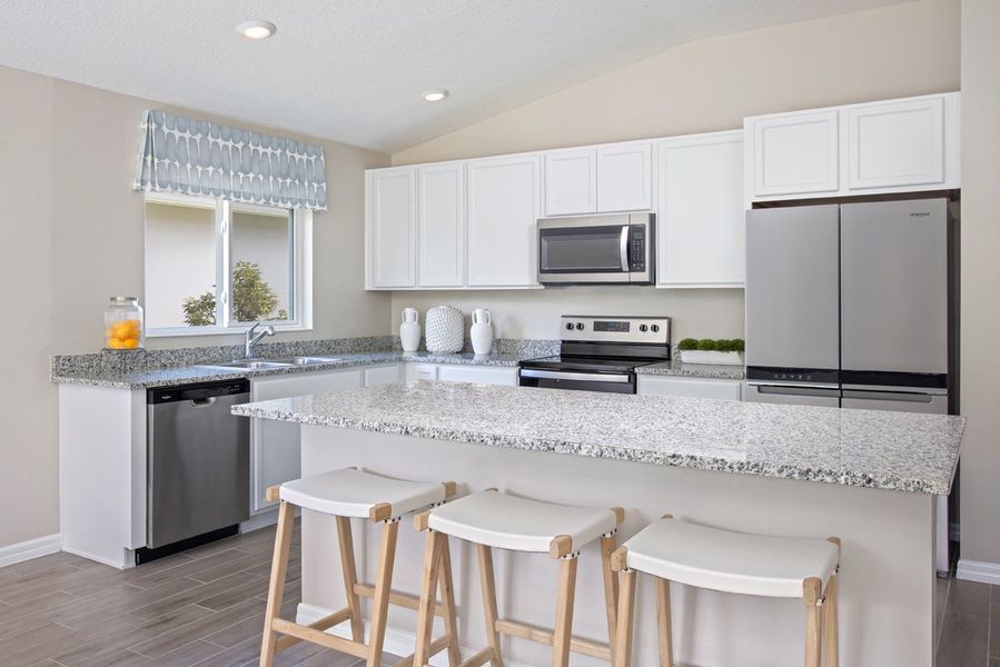 Representative furnished interior of a home built from the 1707 by KB Home in Canoe Creek Reserve III, St. Cloud (Image 3).