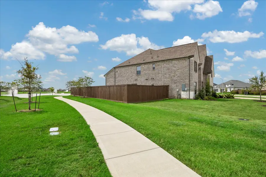 Exterior details and patio area of a home in Del Bello Lakes – 60', Manvel (Image 3).