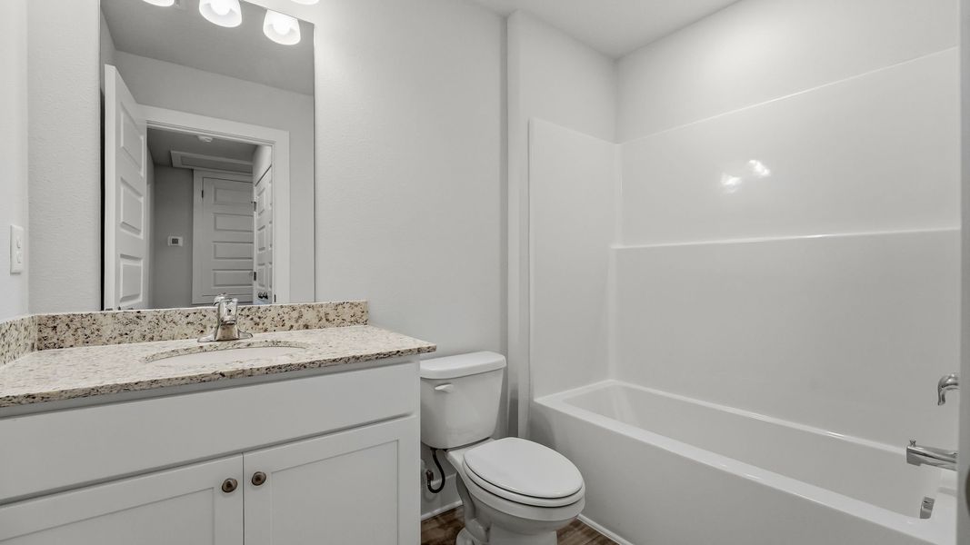 Furnished interior view inside a new home in Chateau Nemours, Port Saint Joe (Image 16).