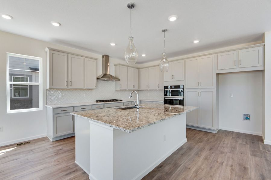 Furnished interior view inside a new home in The Aurora Highlands, Aurora (Image 9).