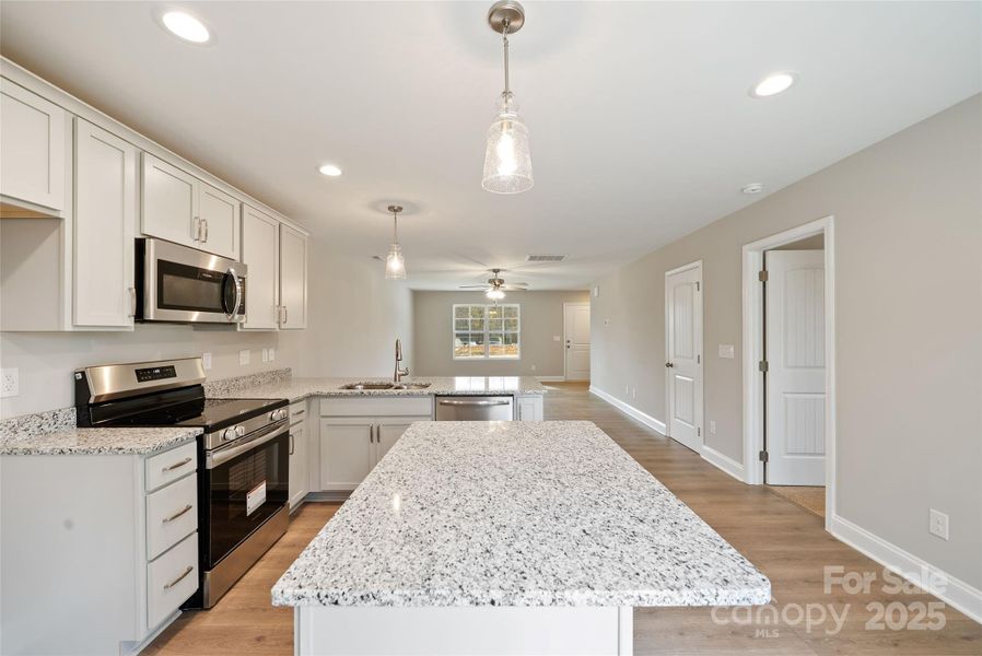 Furnished interior view inside a new home in , Monroe (Image 6).