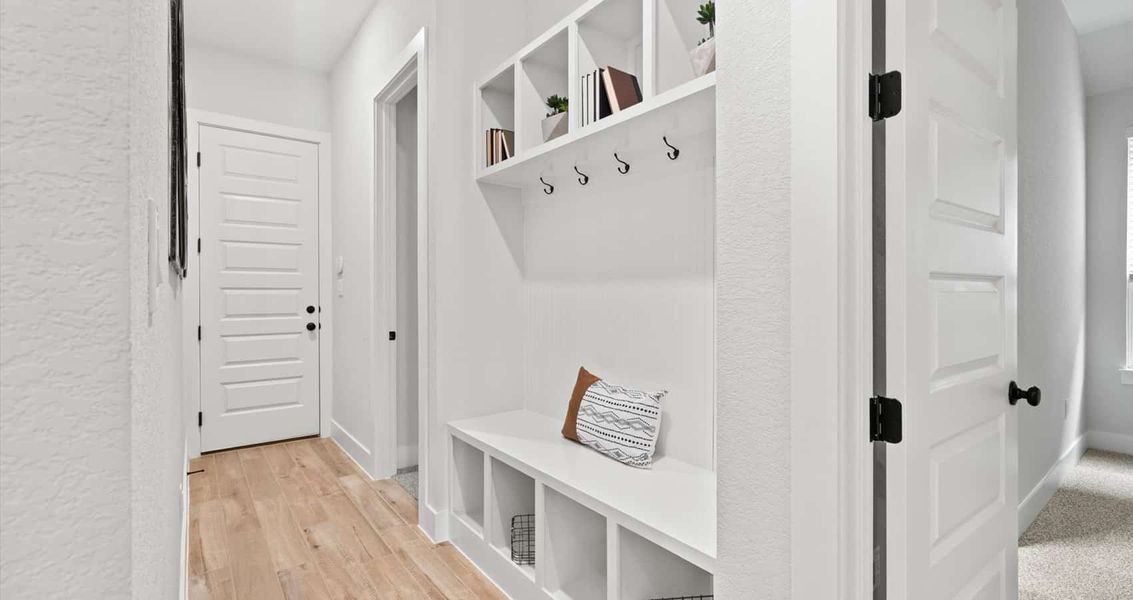 Furnished interior view inside a new home in 6 Creeks, Kyle (Image 12).