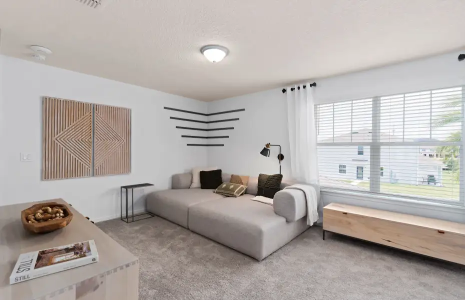 Representative furnished interior of a home built from the Mill Run by Pulte Homes in Waypointe, Port Orange (Image 15).