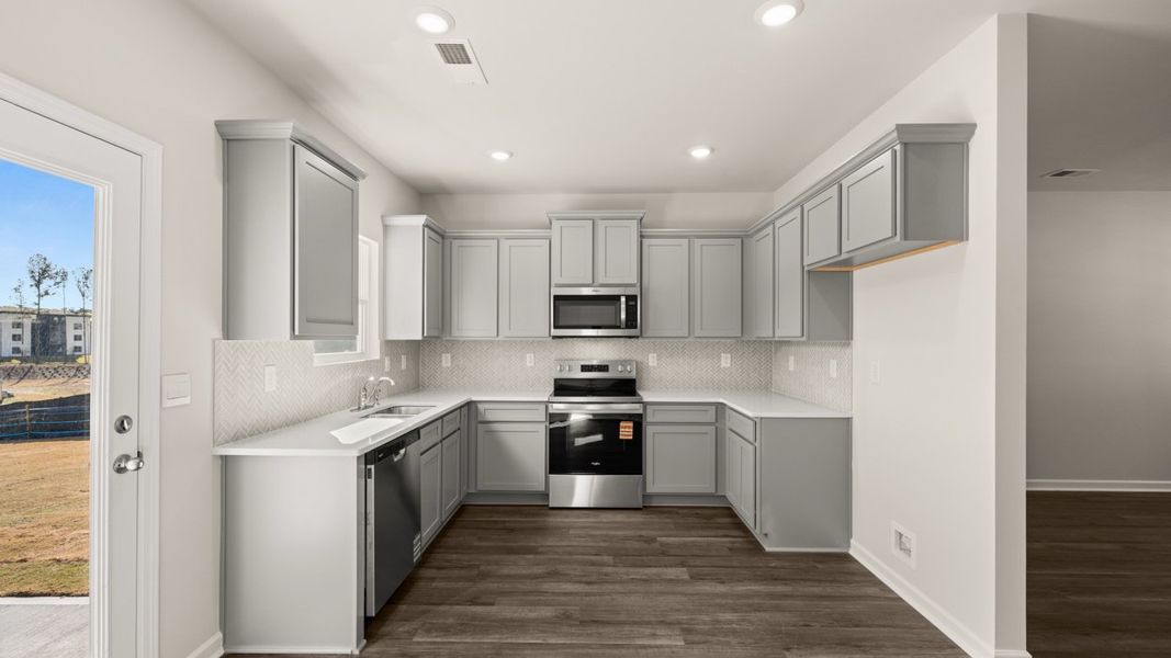 Representative furnished interior of a home built from the Plan by D.R. Horton in WillowBrook, Winder (Image 5).