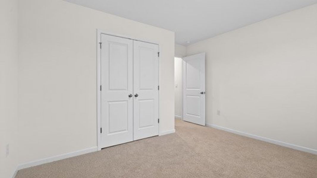Representative unfurnished interior of a home built from the Tillery by D.R. Horton in The Estates Park, Apex (Image 33).