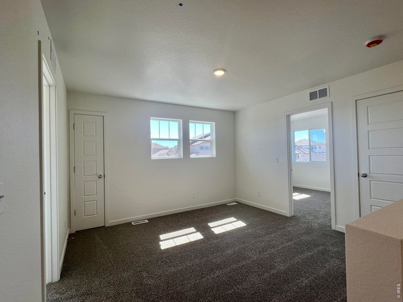 Spacious, unfurnished interior of a new home in Union Colony West, Greeley (Image 18).