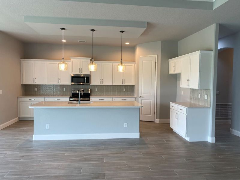 Representative furnished interior of a home built from the Avery by Paytas Homes in The Reserve at Victoria, Deland (Image 37).