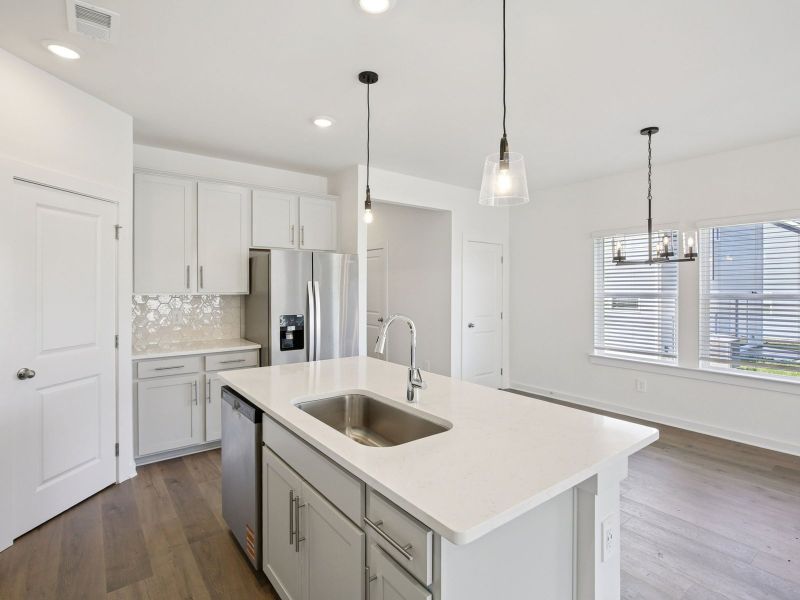Prep dinner in the kitchen without missing the conversation in the great room.