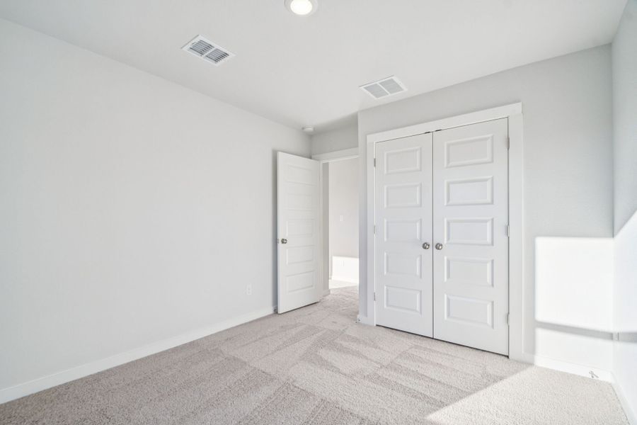 A room with white doors.