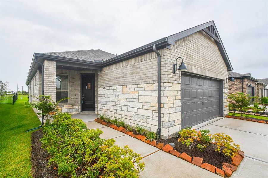 Side front entrance to this modern beautiful home