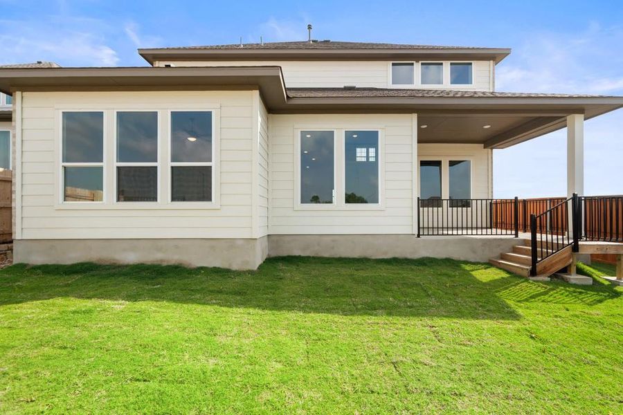 Front exterior of a new home in Park Collection at Lariat, Liberty Hill, TX, highlighting curb appeal (Image 21). Front exterior of a new home in Park Collection at Lariat, Liberty Hill, TX, highlighting curb appeal (Image 21).
