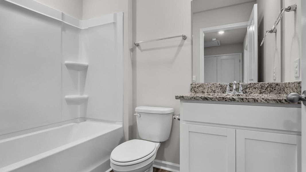 Furnished interior view inside a new home in Townes at Seabrooke, Leland (Image 11).