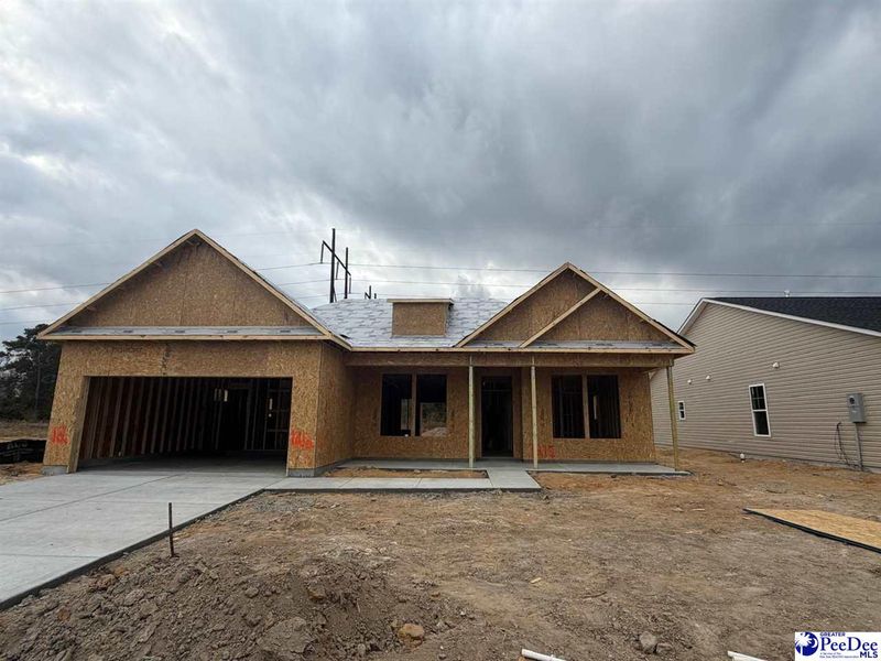 In-progress construction of a new home in The Grove, Florence, SC (Image 4).