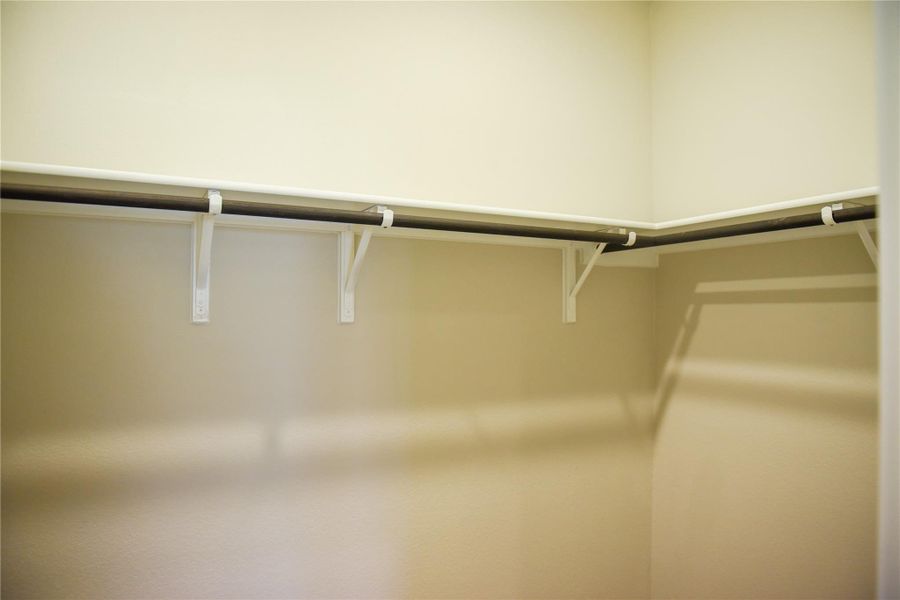 Walk-in closet in Primary Bedroom