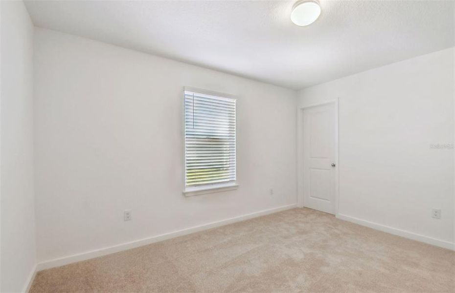 Spacious, unfurnished interior of a new home in Oakfield Lakes, Parrish (Image 13).