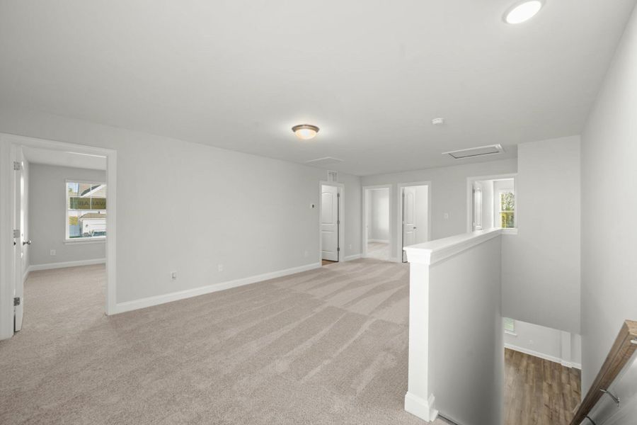 Spacious, unfurnished interior of a new home in Cottages at Piper Village, Trinity (Image 26).