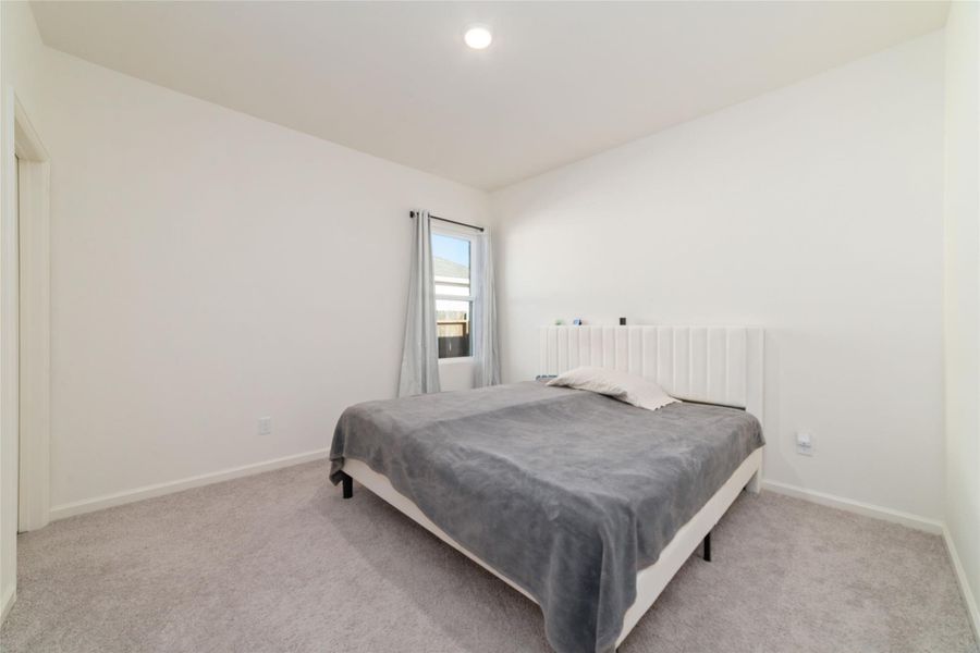 Furnished interior view inside a new home in Sunterra, Katy (Image 13).