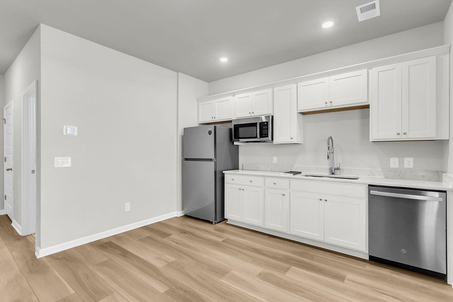Furnished interior view inside a new home in Limehouse Village: Arbor Series, Summerville (Image 15).