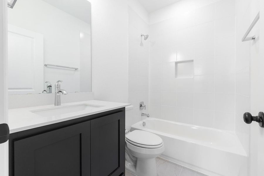 Furnished interior view inside a new home in The Hollows Canyon - 60', Lago Vista (Image 10).