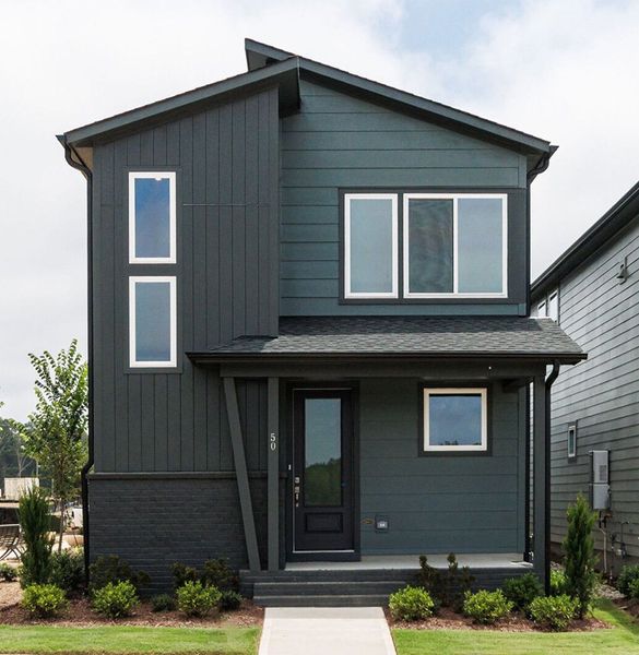 Front exterior of a home in the NoVi Chatham Park - The Mews Collection community, located in Pittsboro, NC (Image 9).
