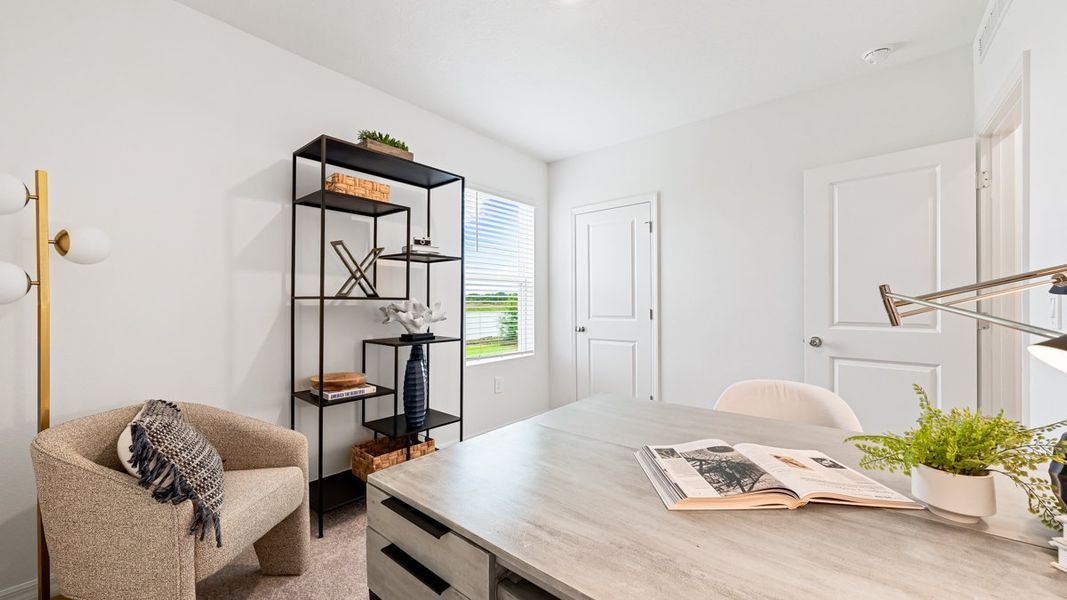 Representative furnished interior of a home built from the Seneca by Taylor Morrison in Palm Wind, Hudson (Image 18).