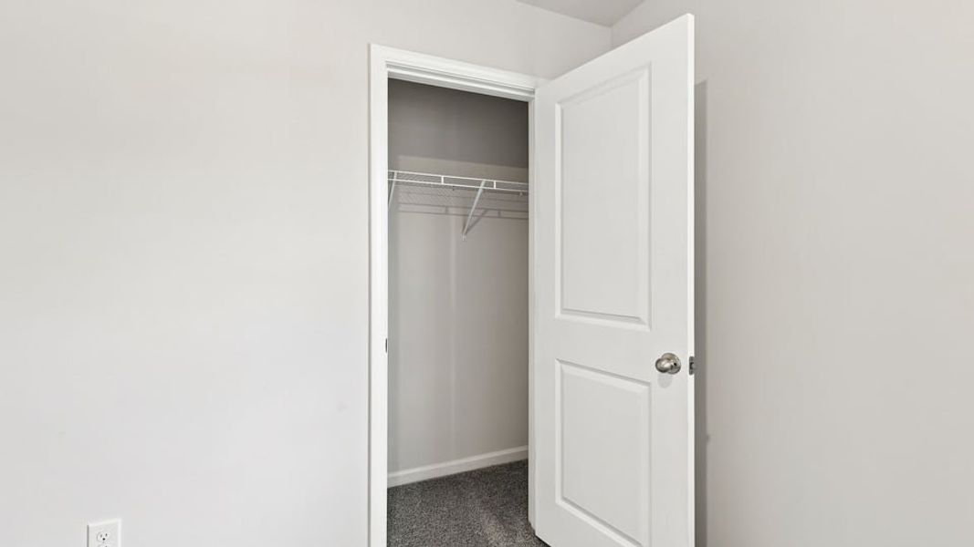 Spacious, unfurnished interior of a new home in Village 3, Woodruff (Image 25).