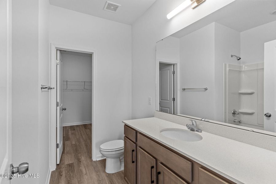 Furnished interior view inside a new home in Coastal Haven Townes, Leland (Image 15).