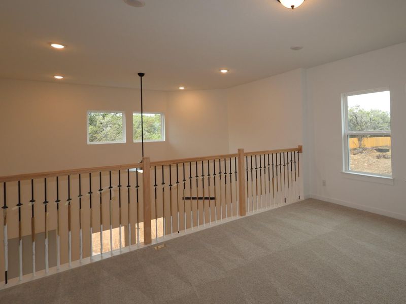 Spacious, unfurnished interior of a new home in Heritage, Dripping Springs (Image 23).
