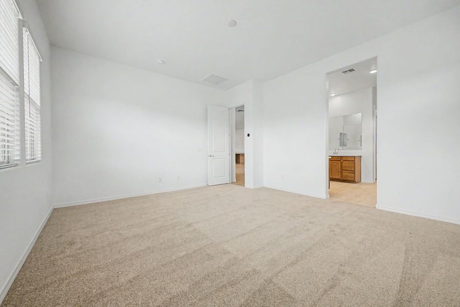 Spacious, unfurnished interior of a new home in Empire Pointe, Queen Creek (Image 14).