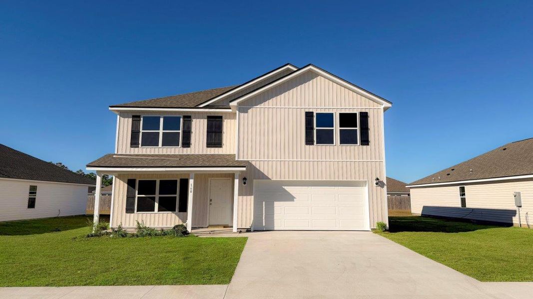 Front exterior of a new home in Wesley Park, Crawfordville, FL, highlighting curb appeal (Image 1).