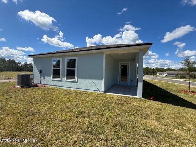 Exterior details and patio area of a home in Grand Reserve, Bunnell (Image 4). Exterior details and patio area of a home in Grand Reserve, Bunnell (Image 4).
