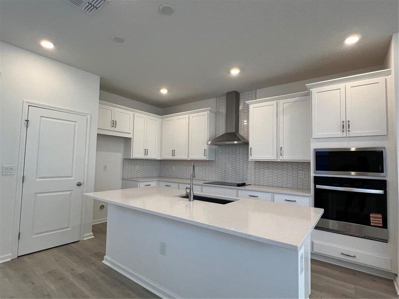 Furnished interior view inside a new home in Hills of Minneola, Minneola (Image 4).