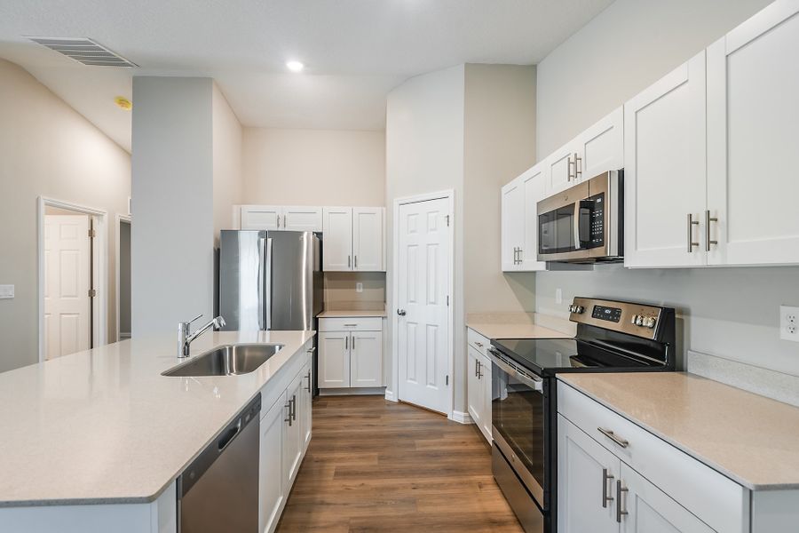 Furnished interior view inside a new home in Scenic Terrace, Haines City (Image 7).