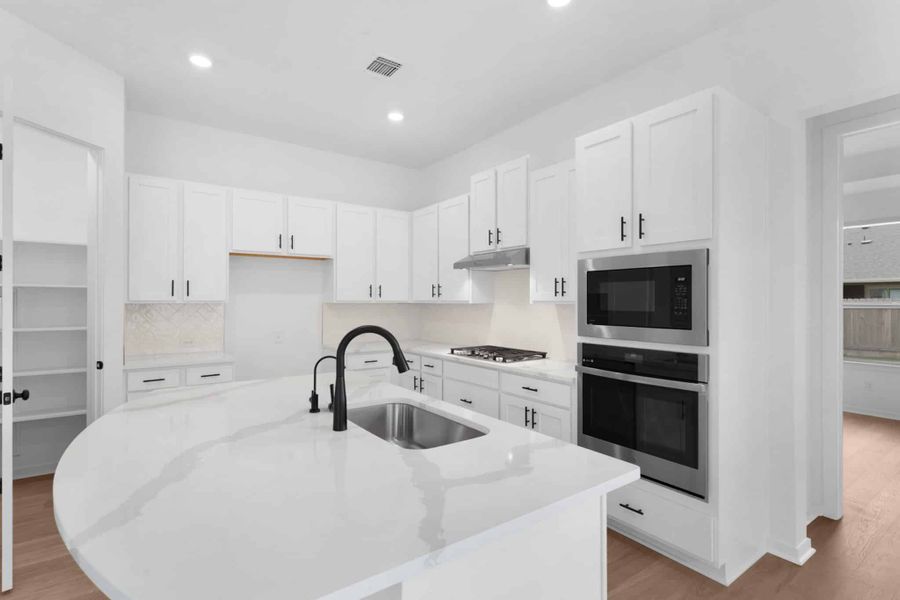 Furnished interior view inside a new home in Carillon, Manor (Image 8).