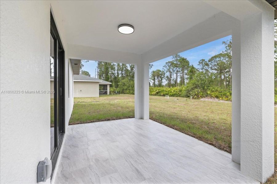 Exterior details and patio area of a home in , Lehigh Acres (Image 28). Exterior details and patio area of a home in , Lehigh Acres (Image 28).