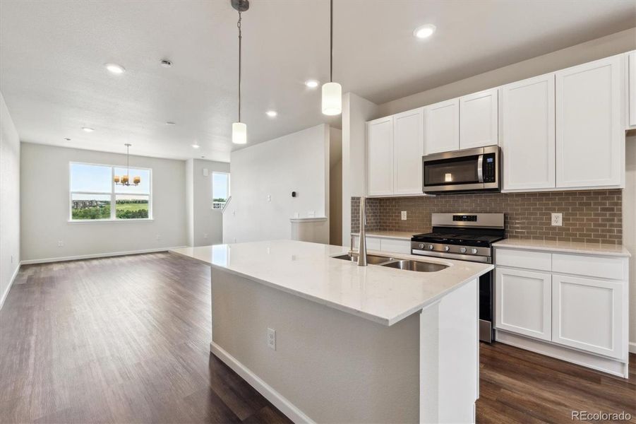 Furnished interior view inside a new home in Townhome Collection at Grand Vue at Interlocken, Broomfield (Image 4).