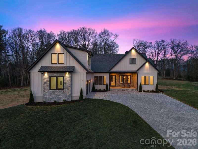 Front exterior of a new home in , Fletcher, NC, highlighting curb appeal (Image 26).