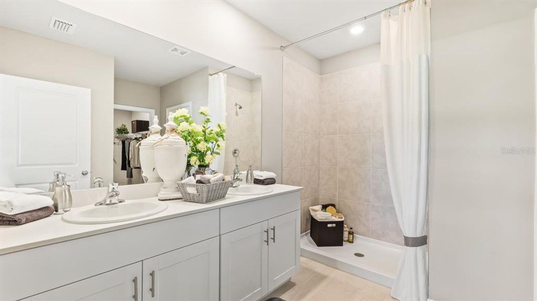 Furnished interior view inside a new home in Central Parc, North Port (Image 14).