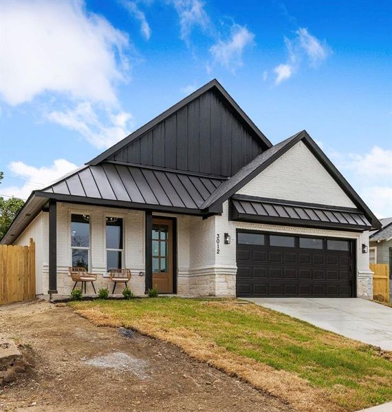 View of front of property with covered porch