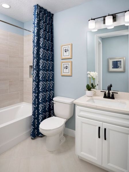 Representative furnished interior of a home built from the Hula by Minto Communities in Latitude Margaritaville Watersound, Panama City Beach (Image 8).
