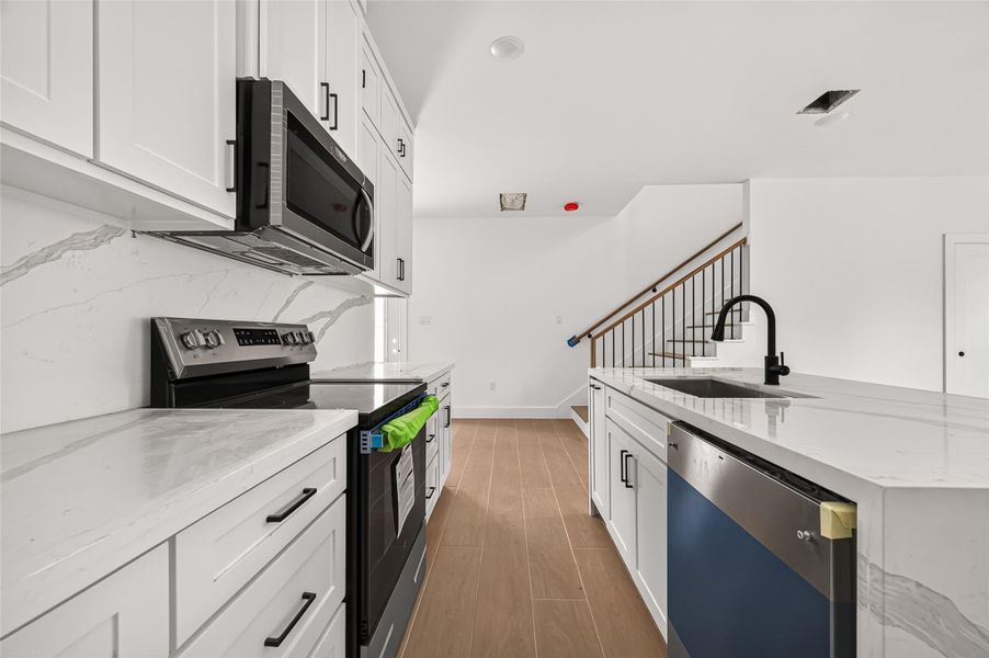 Furnished interior view inside a new home in , Spring (Image 14).