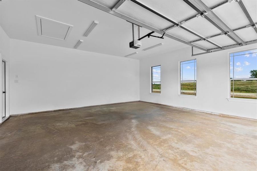 Garage with a garage door opener Garage with a garage door opener