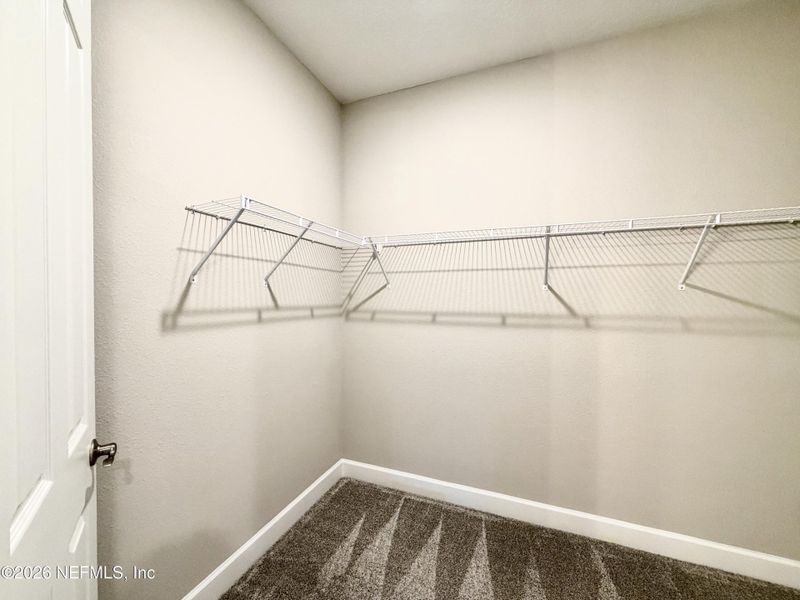 Spacious, unfurnished interior of a new home in Seasons at TrailMark, St. Augustine (Image 70).