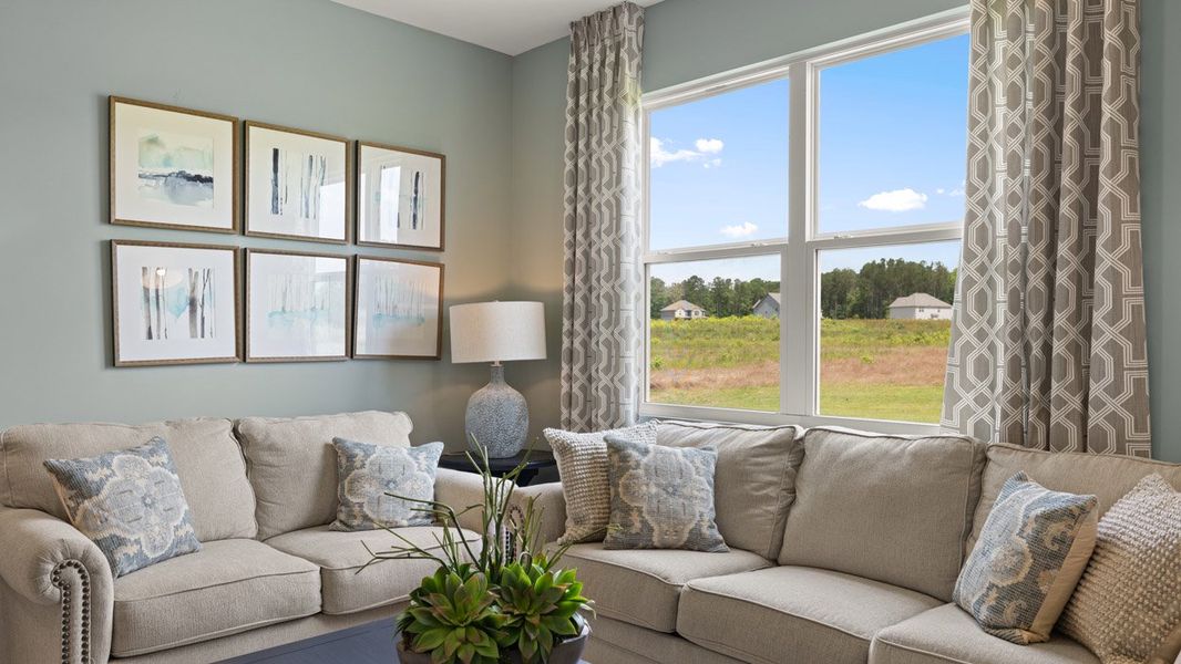 Representative furnished interior of a home built from the Cali by D.R. Horton in Champion's Run, Lithonia (Image 10).