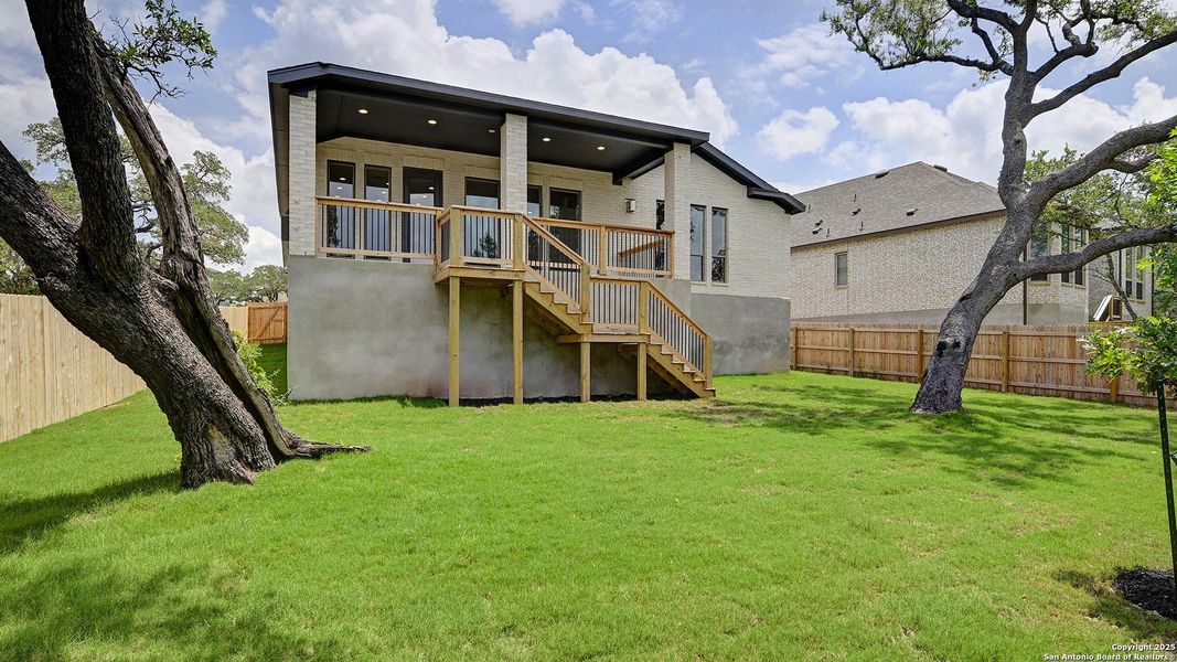 Front exterior of a new home in Ranches At Creekside 55', Boerne, TX, highlighting curb appeal (Image 19). Front exterior of a new home in Ranches At Creekside 55', Boerne, TX, highlighting curb appeal (Image 19).