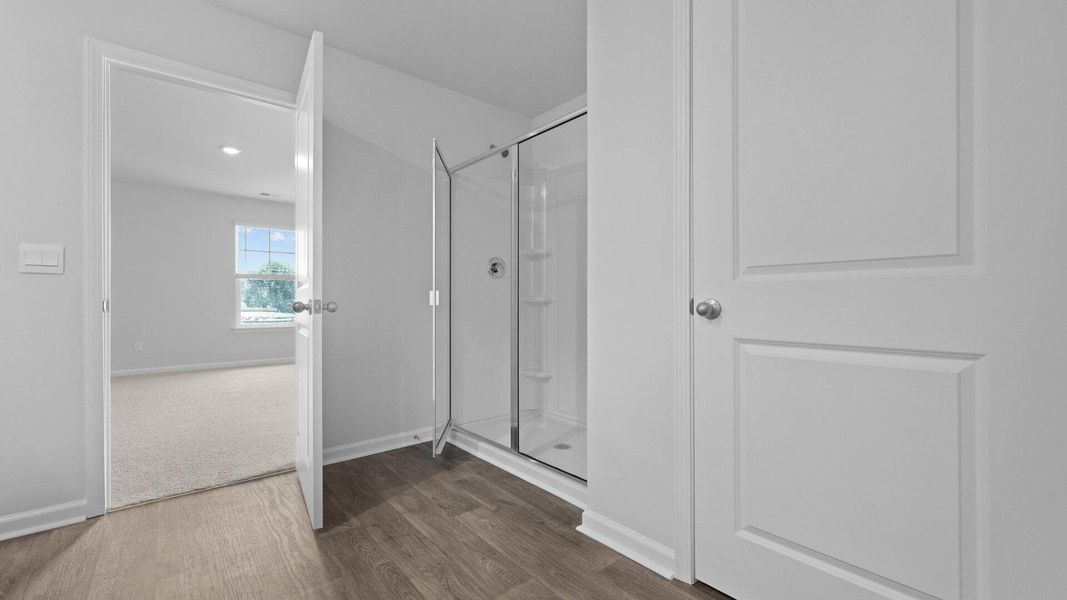 Spacious, unfurnished interior of a new home in Pine Hills at Cane Bay, Summerville (Image 25).