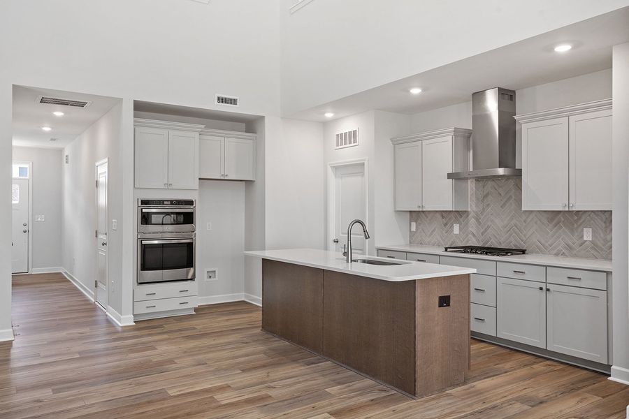 Furnished interior view inside a new home in Ovation at Sweetbrier, Durham (Image 6).