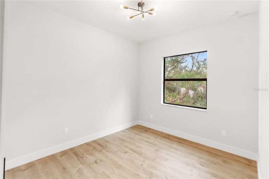 Spacious, unfurnished interior of a new home in , Port Charlotte (Image 26).