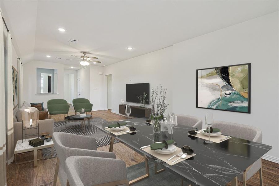 Living room with wood finished floors, recessed lighting, a ceiling fan, and baseboards Living room with wood finished floors, recessed lighting, a ceiling fan, and baseboards